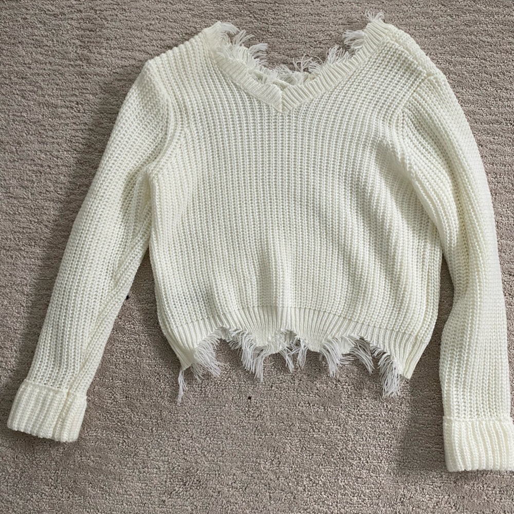 XS cream ruffled sweater.